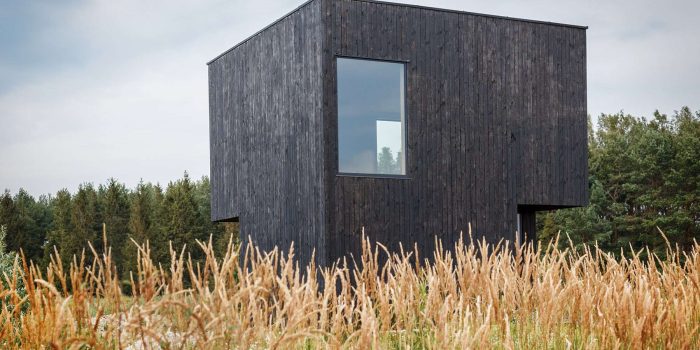 Building facade made of burnt wooden boards. Sho-Sugi-Ban Yakisugi is a traditional Japanese method of wood preservation.