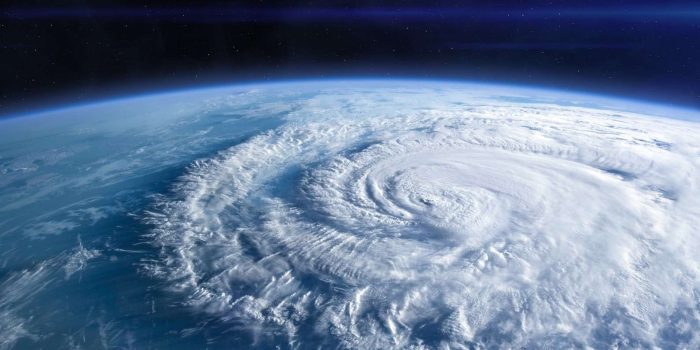 Blue Earth in the space. Hurricane seen from the space over planet Earth. Storm, hurricane, typhoon - concept cataclysm. Elements of this image furnished by NASA.