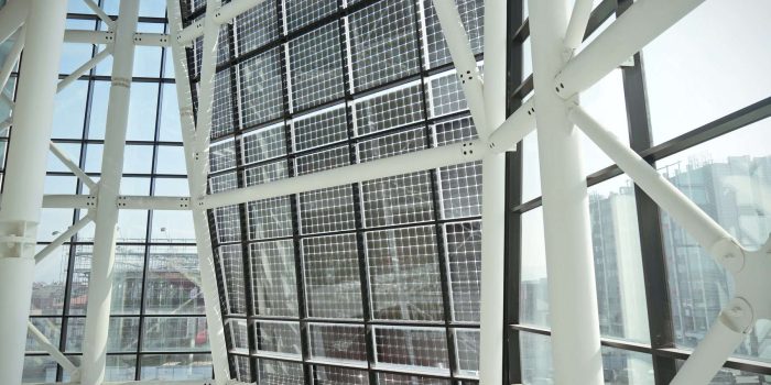 facade of solar panels seen from inside the modern building facade of solar panels seen from inside the modern building