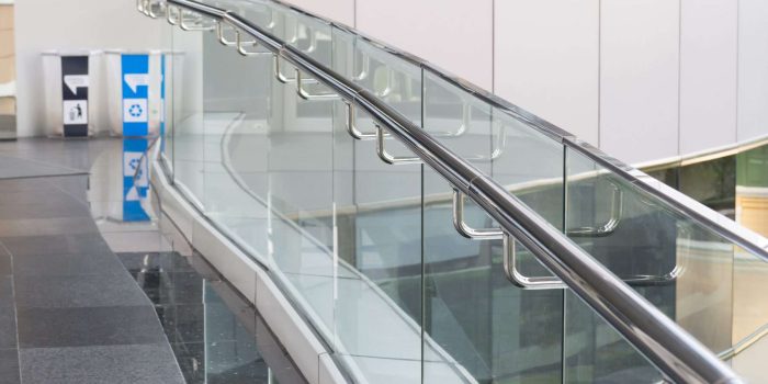 tempered glass of walk way balcony with stainless steel handrail. tempered glass of walk way balcony with stainless steel handrail.